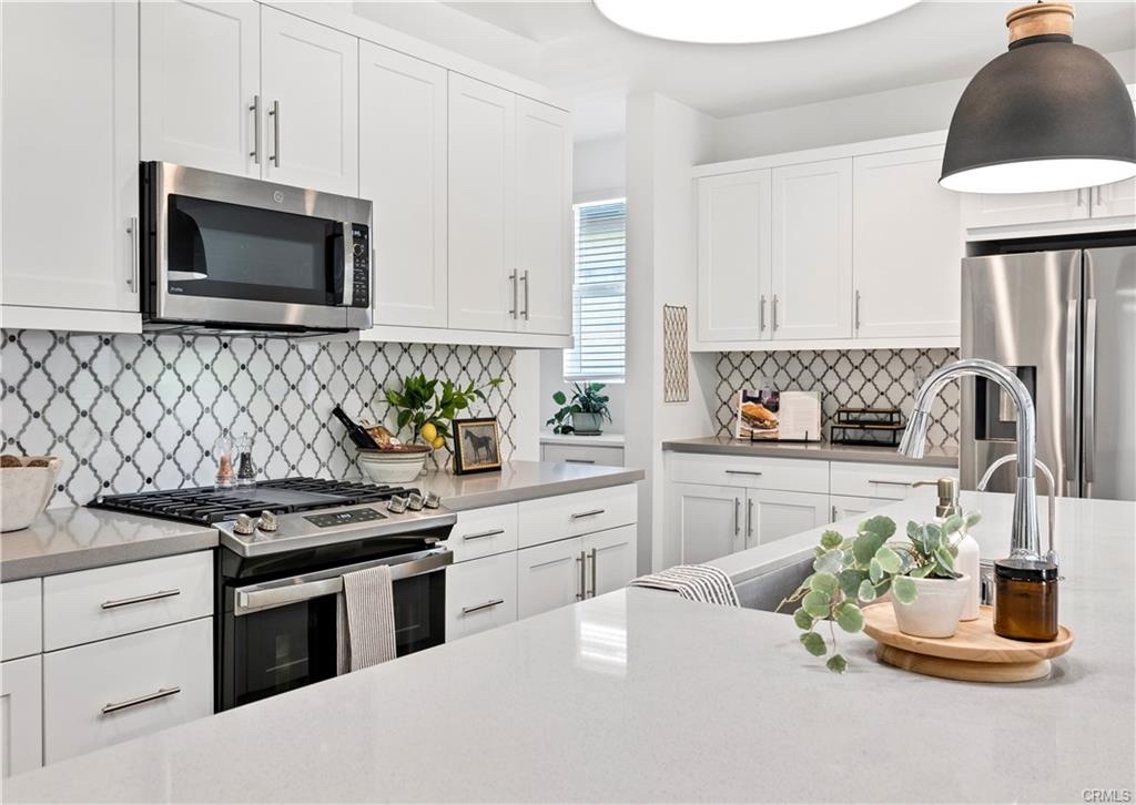 Designer white kitchen at 32037 Sedge Way