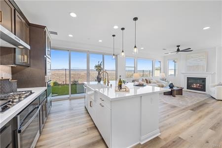 View-facing kitchen and great room at 39673 Sagewood Ridge